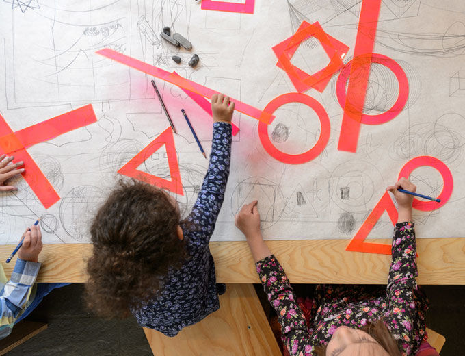 Children interacting with art