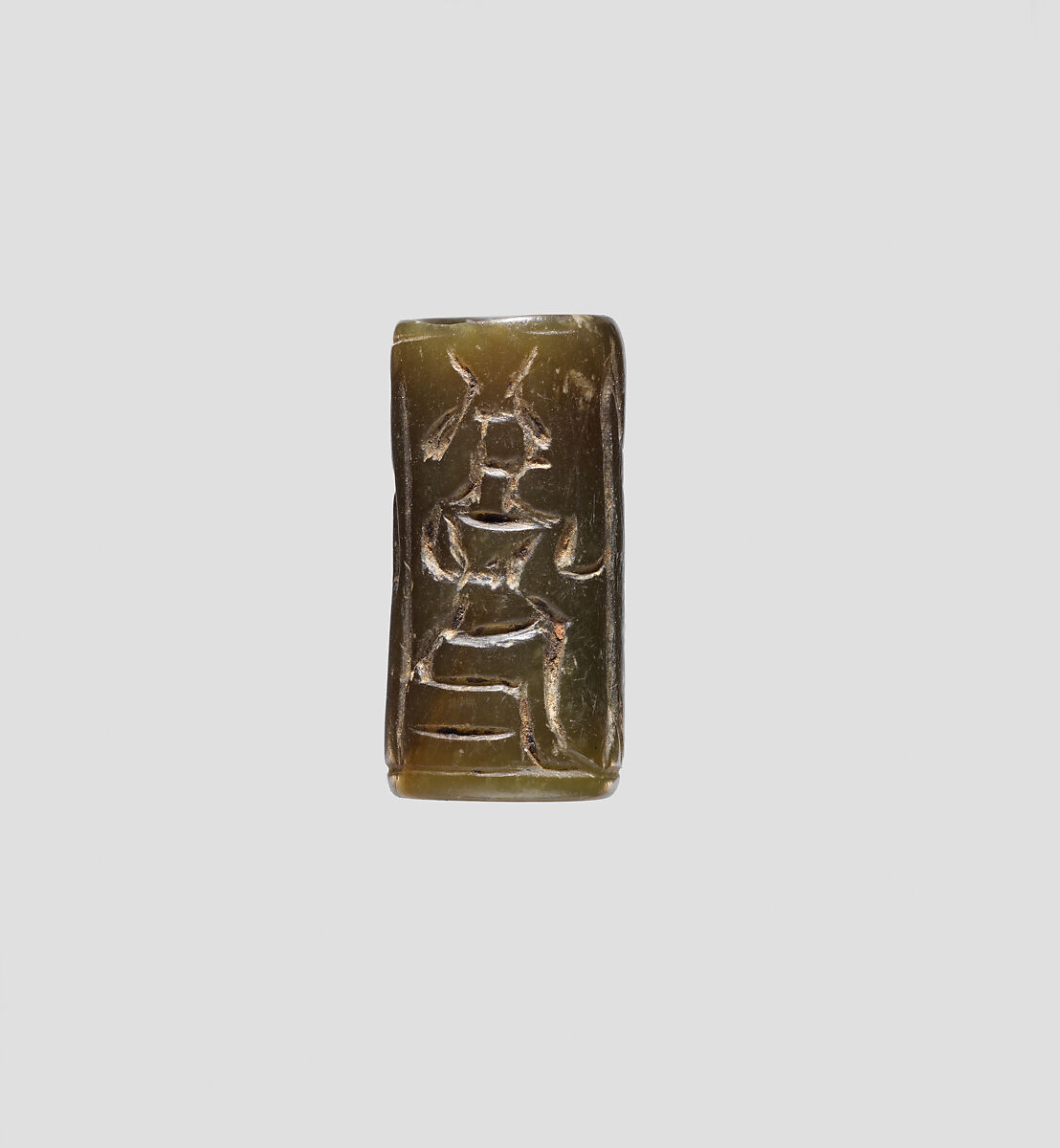 Cylinder seal with an image of seated Hathor, Green muscovite (fuchsite)
