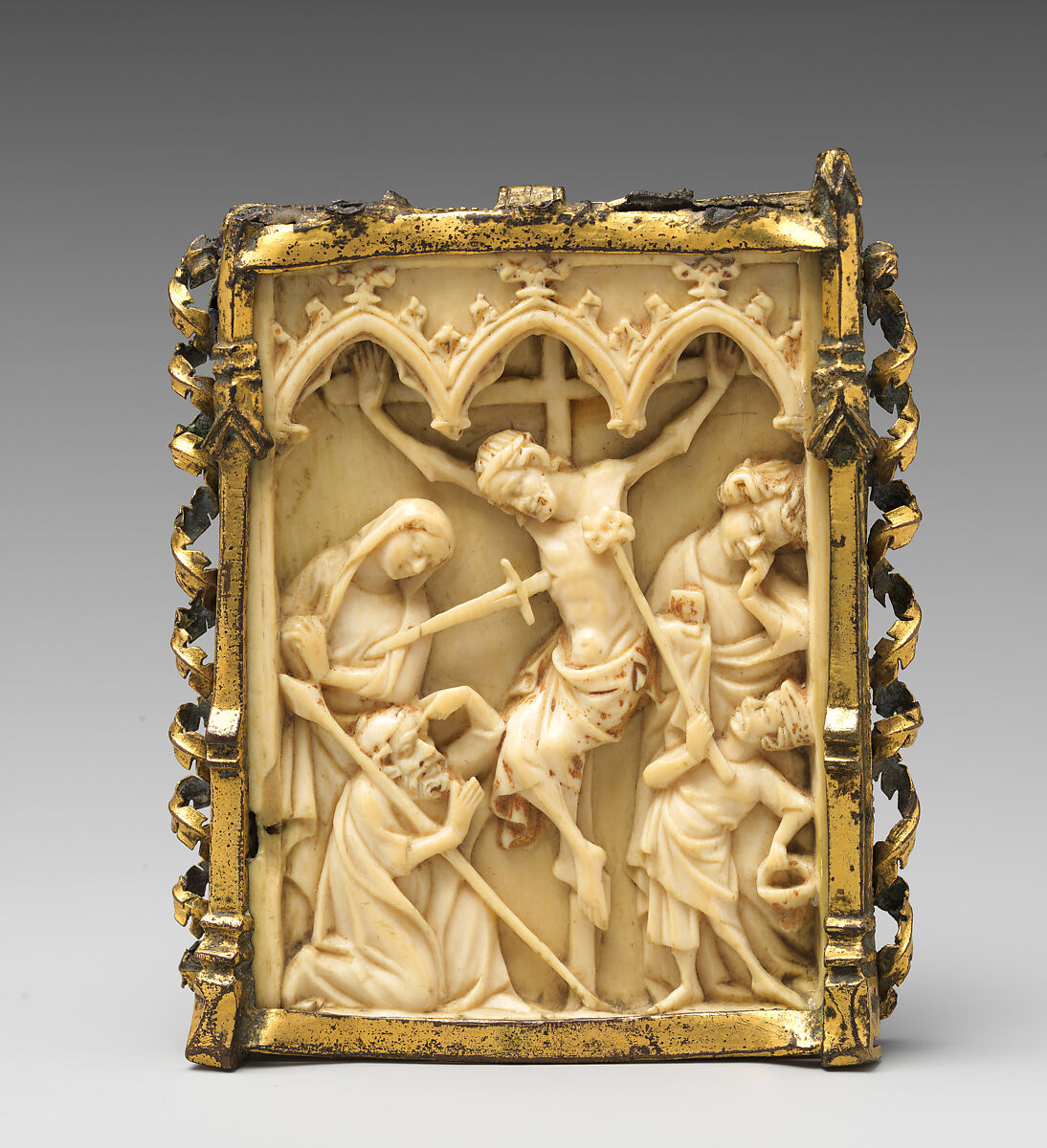 Pax with the Crucifixion, Elephant ivory and gilded copper, South German