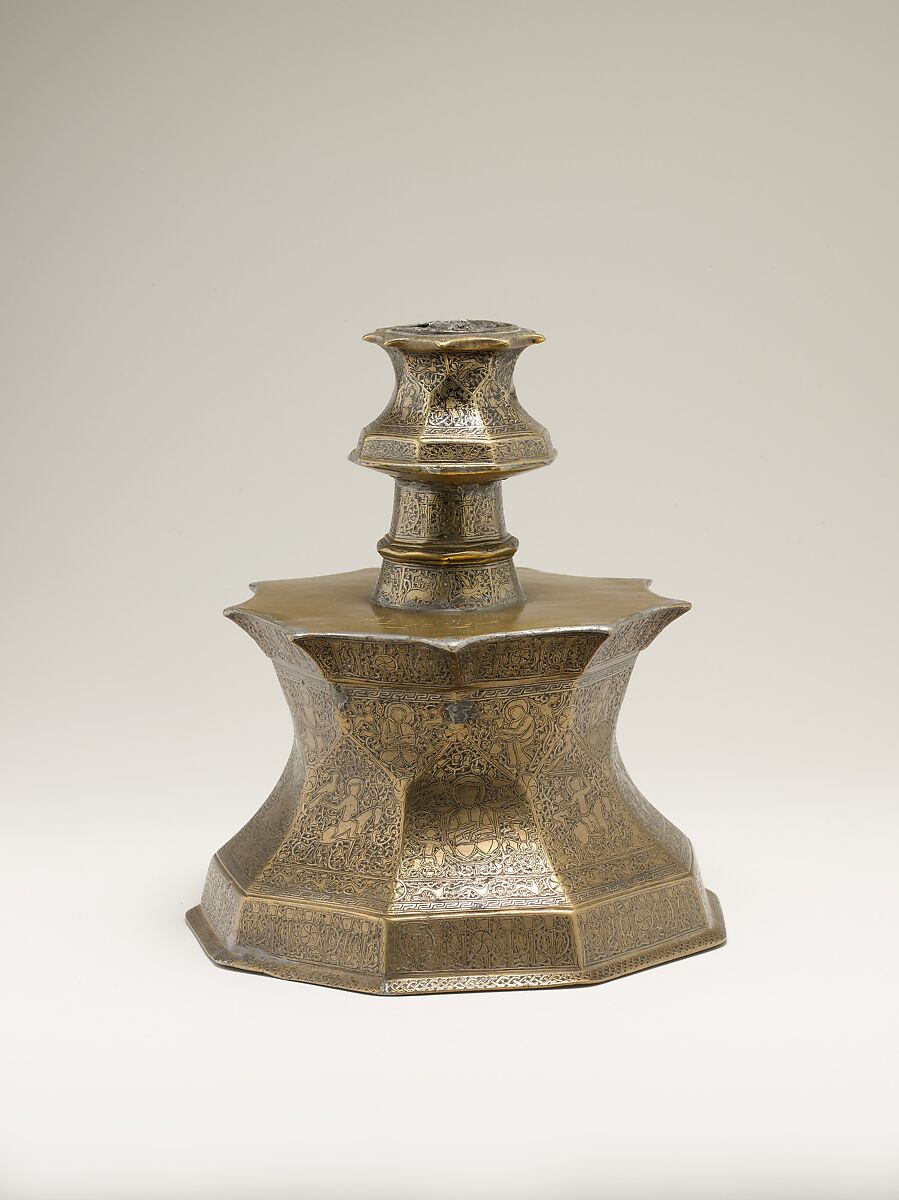 Candlestick with Figural Imagery, Brass; cast, engraved, and inlaid with silver and black compound