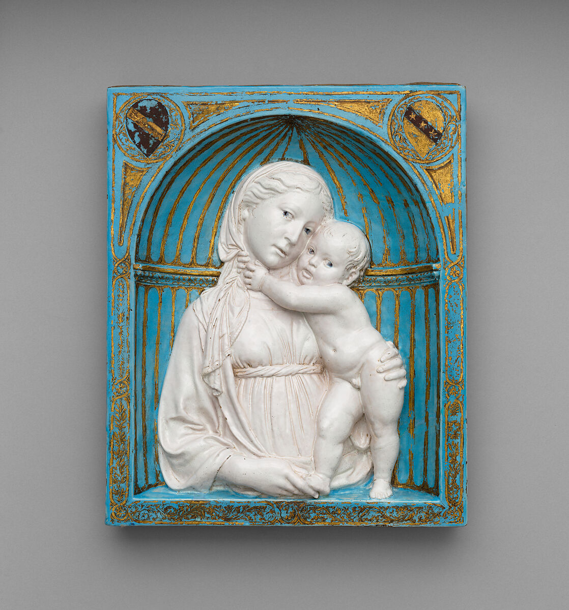 Virgin and Child in a niche, Luca della Robbia  Italian, Glazed terracotta with gilt and painted details, Italian, Florence