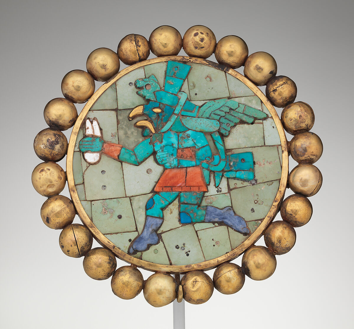 Ear ornament with winged runner, Moche artist(s), Gold, turquoise, sodalite, shell, Moche