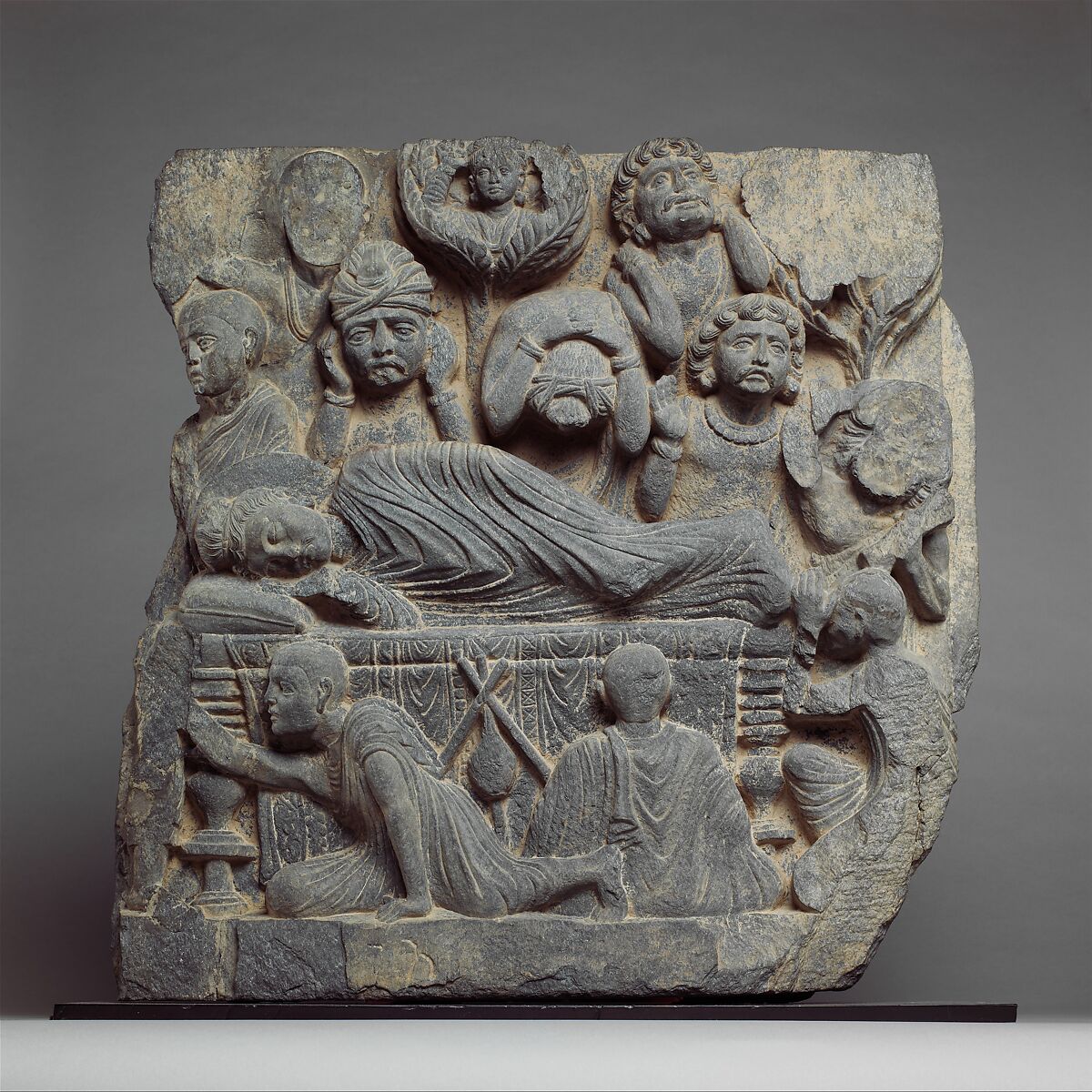 The Death of the Buddha (Parinirvana), Schist, Pakistan (ancient region of Gandhara)