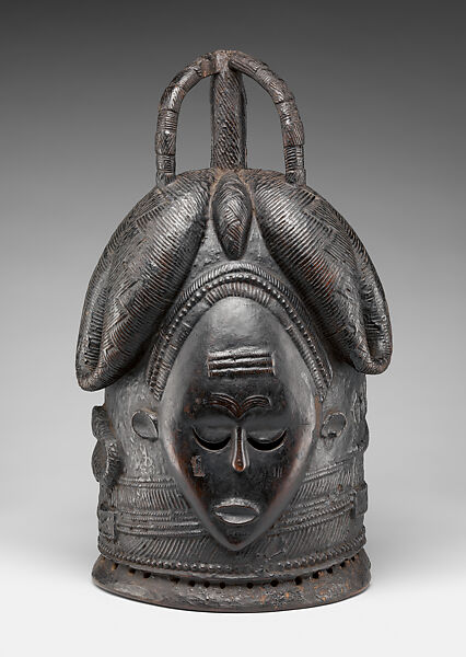 Ndoli jowei mask, Bassa artist, Bombax wood, resinous coating, Bassa peoples