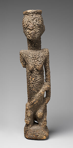 Kneeling female figure with three children, Tellem or Dogon blacksmith, Wood, applied organic materials, Dogon or Tellem  peoples (?)